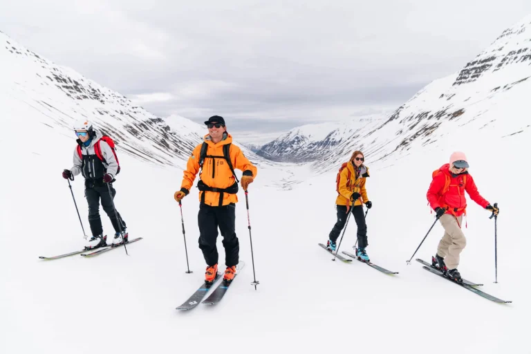 skiers mountain valley expedition